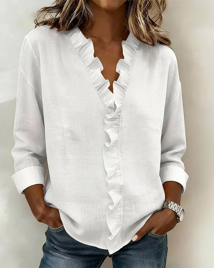 Aletta – Chic blouse with ruffles, V-neck and long sleeves