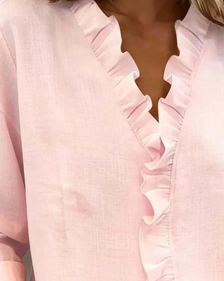 Aletta – Chic blouse with ruffles, V-neck and long sleeves