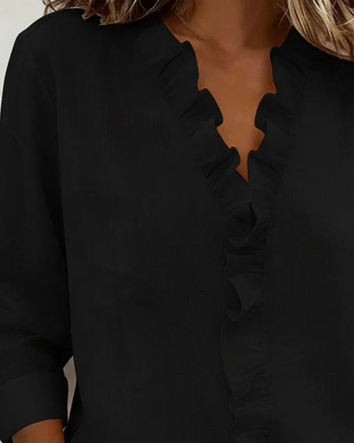 Aletta – Chic blouse with ruffles, V-neck and long sleeves